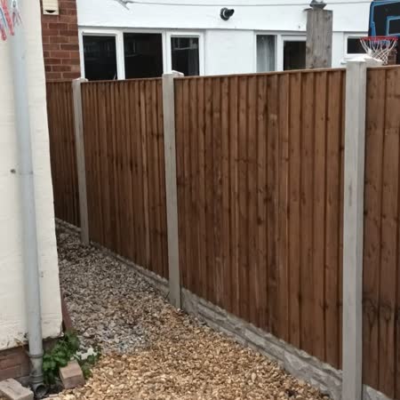 New closeboard fencing with concrete posts and gravel boards