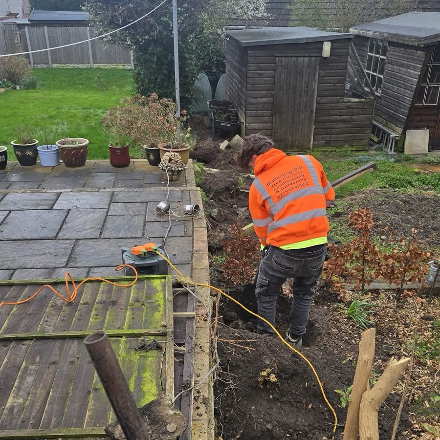 Branching Out operative clearing a garden